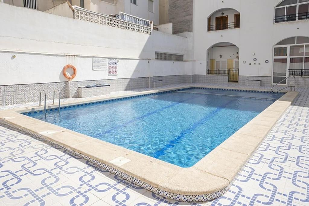 La Casa De Veronica - Serene Apartment With Shared Pool, Steps From The Beach ตอร์เรเวียคา ภายนอก รูปภาพ